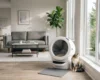 Real Litter-Robot 4 automatic litter box in a modern living room with a cat nearby